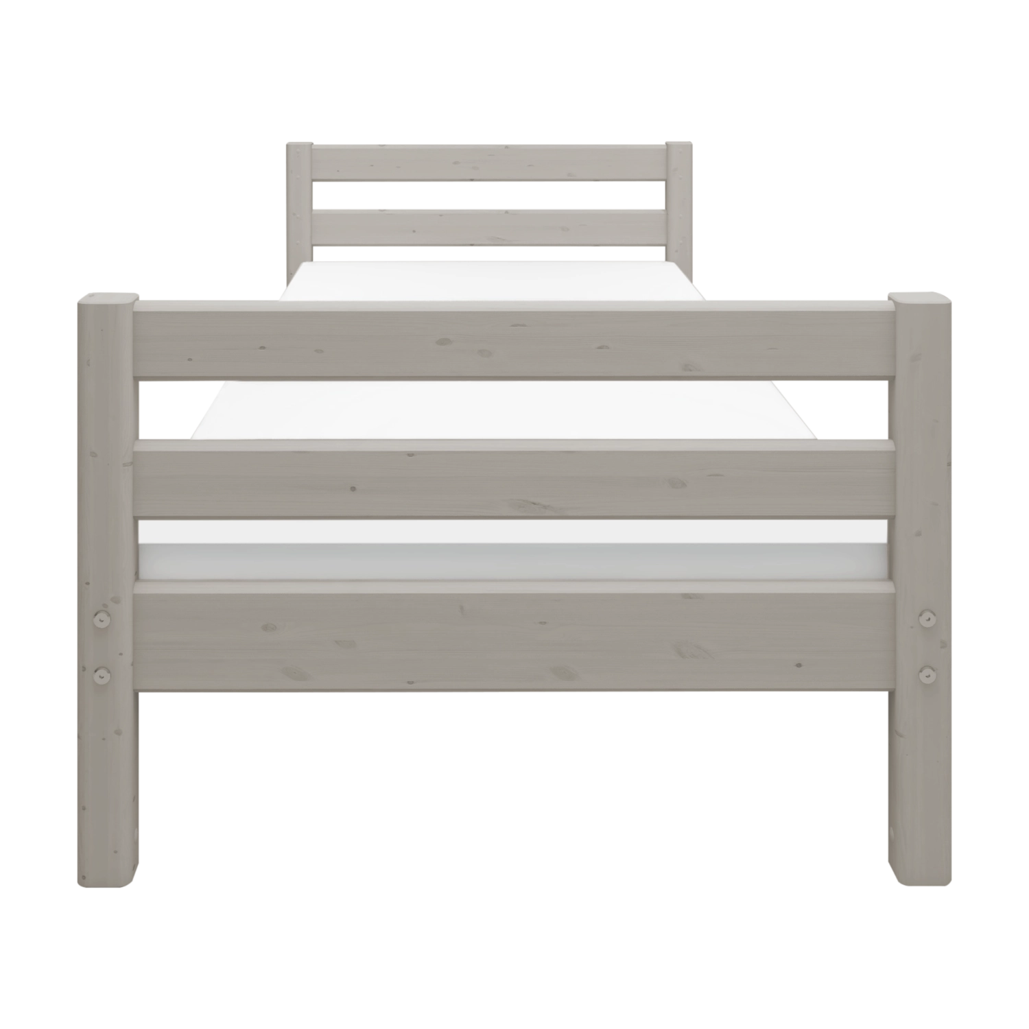 Cama individual FLEXA de la colección CLASSIC, en madera gris claro, mostrada en una habitación infantil con las barandillas visibles.