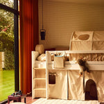 FLEXA loft bed and ROSE Back Rest Cushion in childrens room with soft toy, window, and child-safe rounded edges visible.