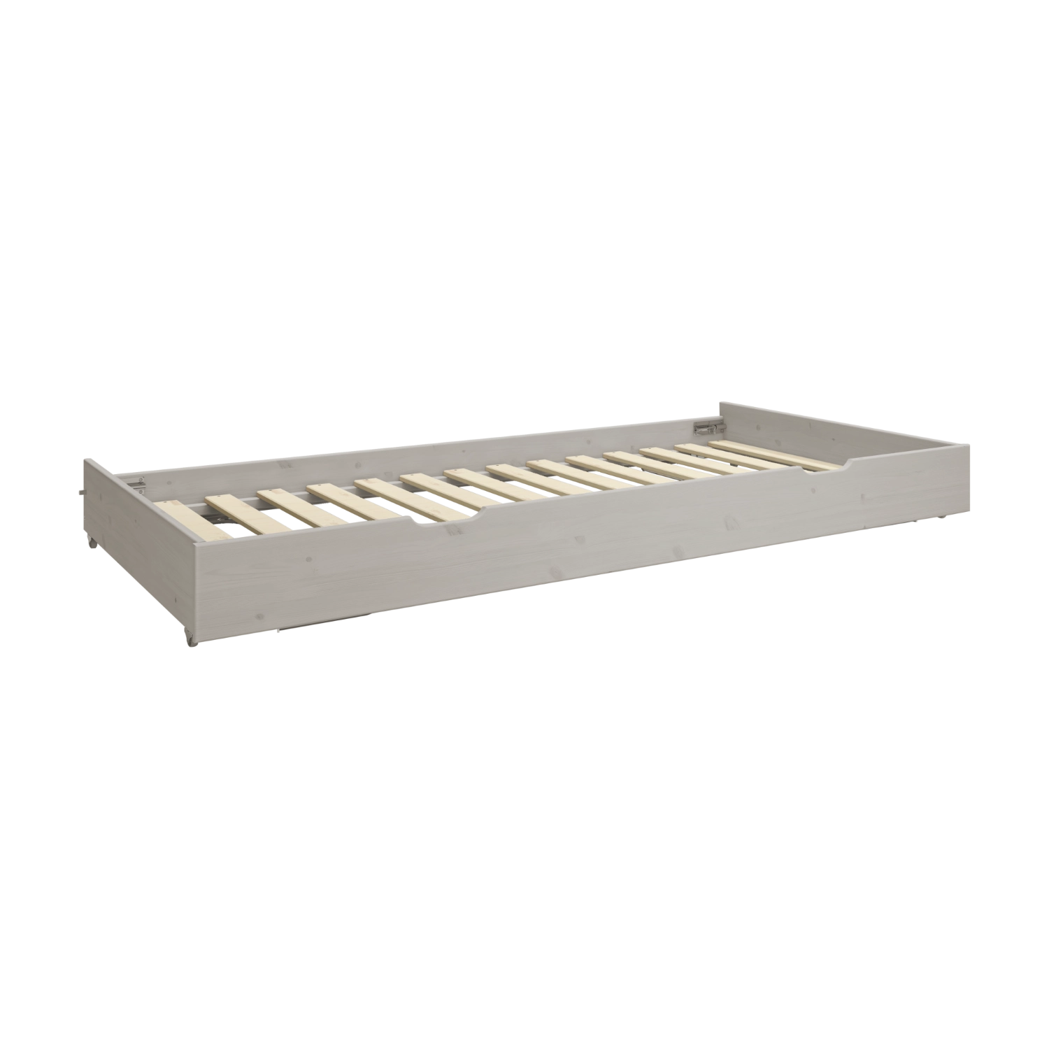 Cama extraíble FLEXA de la colección CLASSIC, en madera gris con somier de listones, mostrada en una habitación infantil; diseño con bordes redondeados y seguro para los niños.