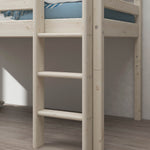 FLEXA high bed from WHITE collection with slide and ladder, white frame, blue striped bedding on light wood floor.