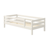 FLEXA single bed from WHITE collection with safety rail, white finish, slatted base, child-safe design for toddler’s room.