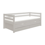 Cama individual gris FLEXA con cama extra extraíble, cajones de almacenamiento y barandilla de seguridad, tal y como se muestra en una habitación infantil.