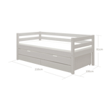 Cama individual FLEXA con cama extra extraíble, color gris, espacio de almacenamiento a la vista y barandilla de seguridad; se muestra en una habitación infantil.