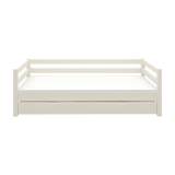 FLEXA CLASSIC white single bed with pull-out guest bed, visible safety rails, child-friendly design on plain backdrop.