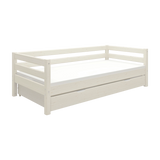 FLEXA single white bed with pull-out guest bed, wood, shown in a plain room setting. Child-safe rounded corners visible.